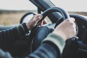 male hands driving.Travel concept