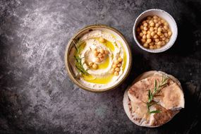 Hummus and chickpeas in a bowl