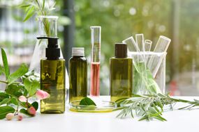 Natural skin care beauty products, Natural organic botany extraction and scientific glassware, Blank label cosmetic container for branding mock-up.